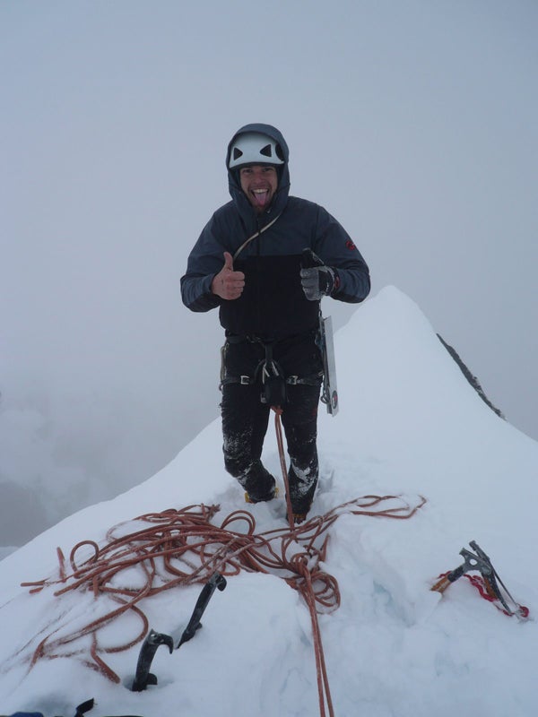 Josh Wharton on top of Kichatna Spire, Josh Wharton on top of Kichatna Spire, a peak that has had fewer than 10 ascents. Courtesy of Josh Wharton - Mammutathleteteam.blogspot.com.