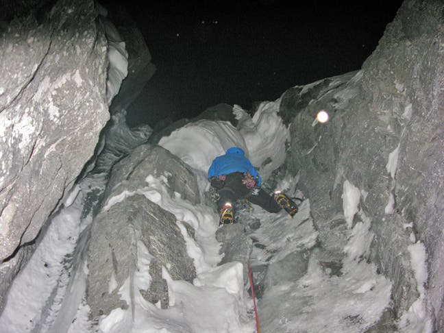 Walsh leads the second-to-last pitch on the face, after dark on the second day. Photo by Jon Simms.