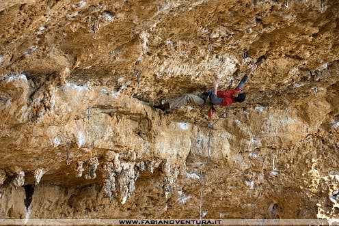 Gianluca Daniele powers though the steeps of Grandi Gesti (5.14d/9a), in the Areonauta Cave, Sperlonga, Italy. Photo by Fabiano Ventura…