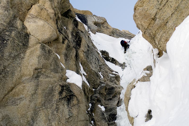 The Anchorage climber Seth Holden enjoy The Anchorage climber Seth Holden enjoys perfect late-May conditions on a high crux (AI4) on Ham and Eggs, (V 5.9 AI4), Mooses Tooth, Ruth Gorge,…