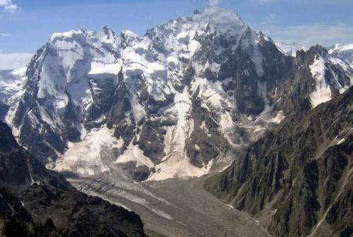 The north ridge of Mizhirgi East (seen The north ridge of Mizhirgi East (seen in summer) faces the camera on the far left side of the photo. Courtesy of Mountain.ru.