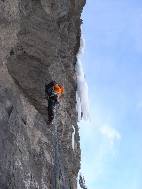 Tim Emmett heads toward the final ice d Tim Emmett heads toward the final ice dagger on the first free ascent of Sous L’Oeil des Choucas (300m, WI7 M9). Photo by Jérôme…