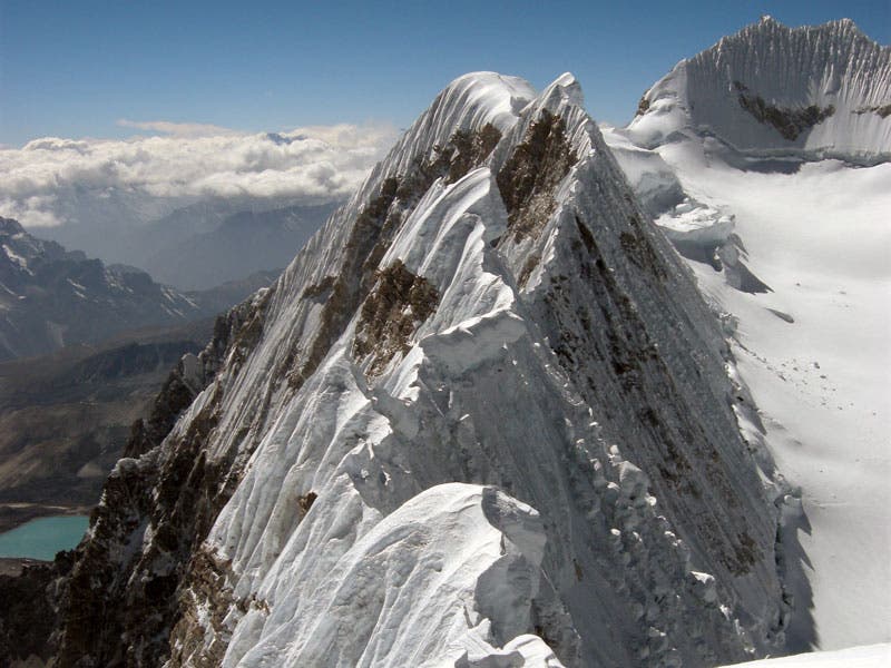 The corniced ridge between Jobo Rinjang and the main summits of the Lunag massif. The two climbers spent a full day trying to negotiate the ridge,…