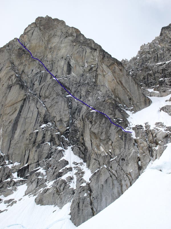 The first 11 pitches of Prizefight (V 5.9R, WI4+/5 M6); the route continues another seven pitches to the 10,300-foot south summit of Mt. Huntington.…