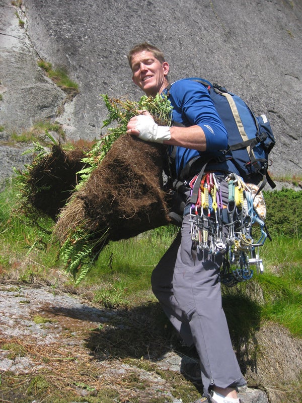 Brian Heppner exhibits a thick section Brian Heppner exhibits a thick section of turf removed from the route. Photo by Rob Pizem