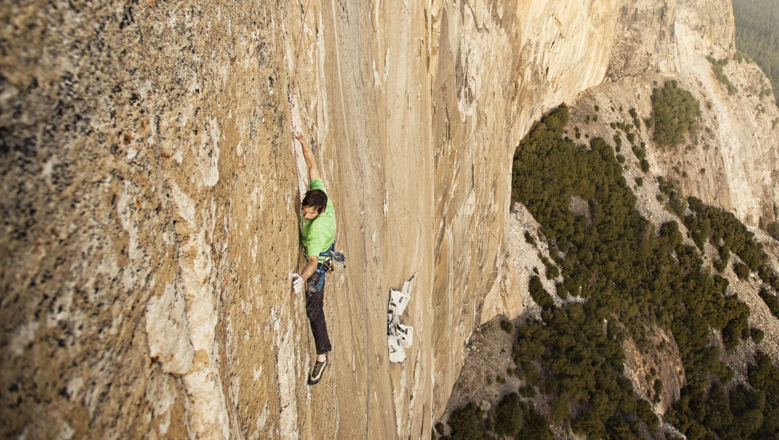 Climber ascends Dawn Wall, El Capitan.