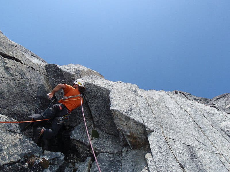 Jason Nelson prepares to pull the 5.12- Jason Nelson prepares to pull the 5.12- crux roof of The Iron Curtain in the Mendenhall Towers. Photo by Blake Herrington.