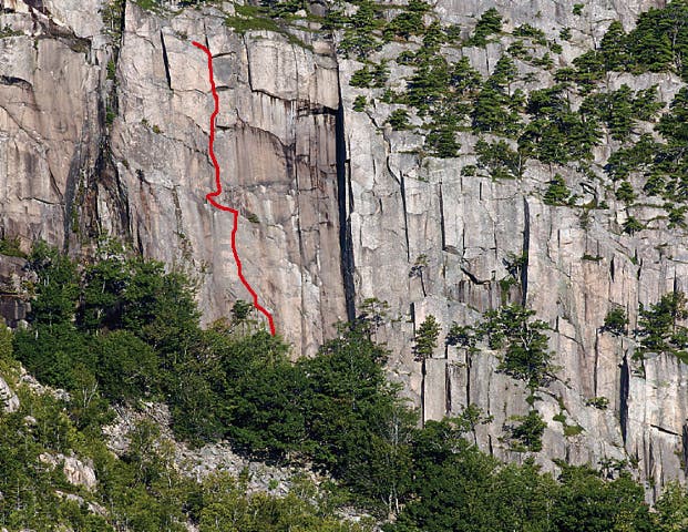 Sea Gypsy (II 5.9+ R) is shown with the Sea Gypsy (II 5.9+ R) is shown with the red line and is located 50 feet left of Chitlin Corner, the obvious open book. Photo by Celin Serbo /…