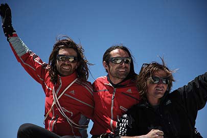 Thomas Huber, Alexander Huber, and Mari Thomas Huber, Alexander Huber, and Mario Walder (left to right) on Trango Tower’s 20,508-foot summit. Photo by Fritz Hinderbrandner /…