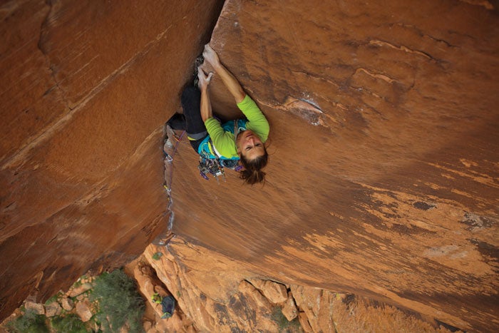 Trad-Climbing-Pro_33794 A trad climber realizing she may not have enough gear for the rest of her climb