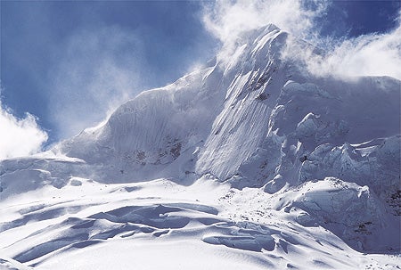 222- Wade McKoy_2213.jpg Light weather moving past Toqllaraju (20,113 feet), Cordillera Blanca, Peru © Photo by Wade McKoy