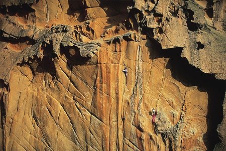 224- Pascal Tournaire_2218.jpg Arnaud Petit and Stef Bodet savor Mediterranean granite on the 5.12d fourth pitch of Delicatessen, Aiguille de Bavella, Corsica © Photo by Pascal…