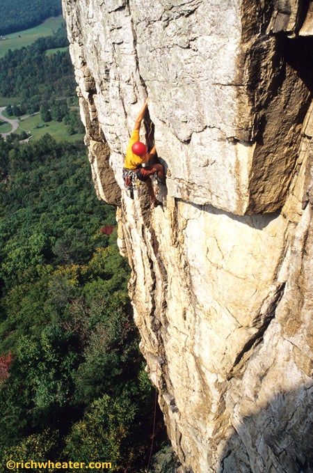 Crack of Dawn BR_10906.jpg Brian Raffield on Crack of Dawn 5.10a, Seneca Rocks, West Virginia © Photo by Rich Wheater