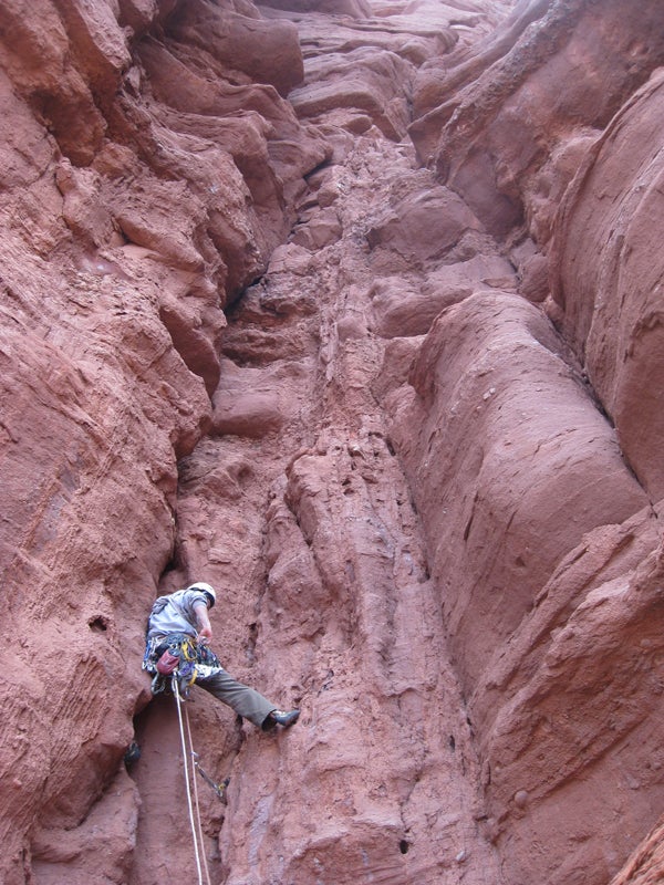 Jason Haas onsighting Fisher Towers pet Jason Haas onsighting Fisher Towers petrified mud on West Side Story (5.12+ R). Photo by Rob Pizem.