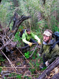 Josh Beckner (left) and Jared Spaulding Josh Beckner (left) and Jared Spaulding hacking their way into the Piritas Valley. Photo by Dave Anderson.
