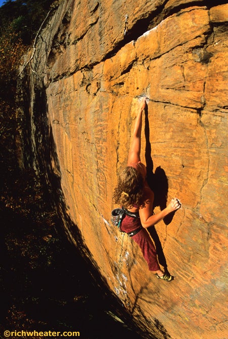 Orange Juice SP2_10911.jpg Senja Palonen on Orange Juice 5.12c, Red River Gorge, Kentucky © Photo by Rich Wheater