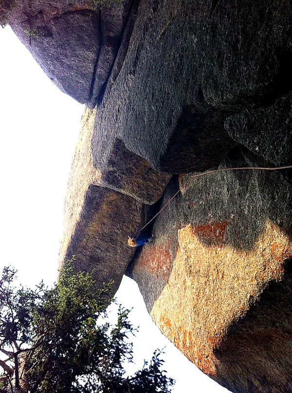 Pamela Pack gets inverted on The Foreve Pamela Pack gets inverted on The Forever War (5.13c/d). Photo courtesy Pamela Shanti Pack