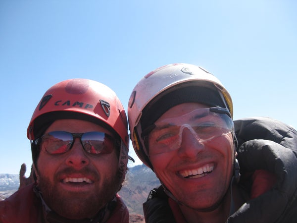 Rob Pizem (left) and Jason Haas, cold, Rob Pizem (left) and Jason Haas, cold, battered, but happy on the summit of Cottontail. Photo by Rob Pizem.