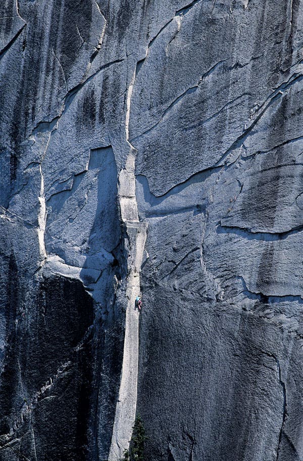 Climbing the Split Pillar on Grand Wall Climbing the Split Pillar on Grand Wall, with teh 5.11a Sword laybacks above. Photo by Jim Thornburg