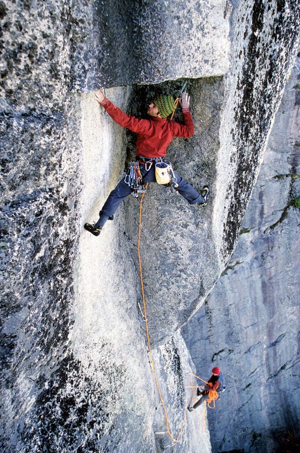 Jean-Pierre Man climbs rock in New Hampshire.