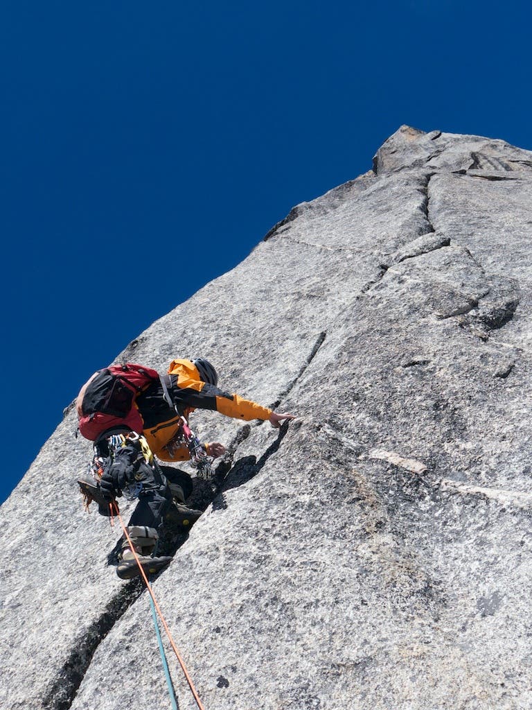 Dave Anderson leading beautiful granite during the first ascent of Mt. Dayantianwo in China.