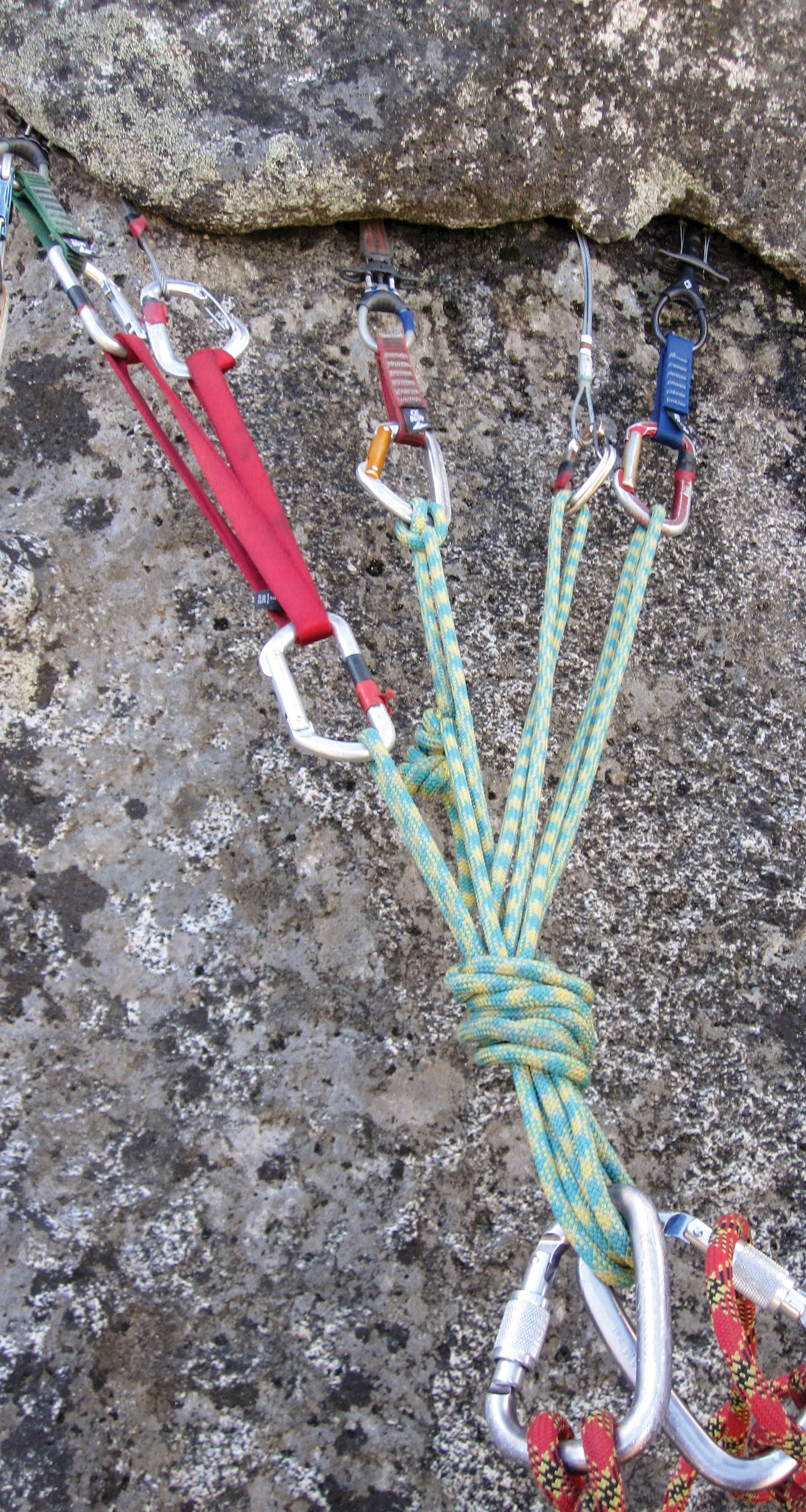 five-piece Trad Climbing Anchor Cams Nuts Rock points
