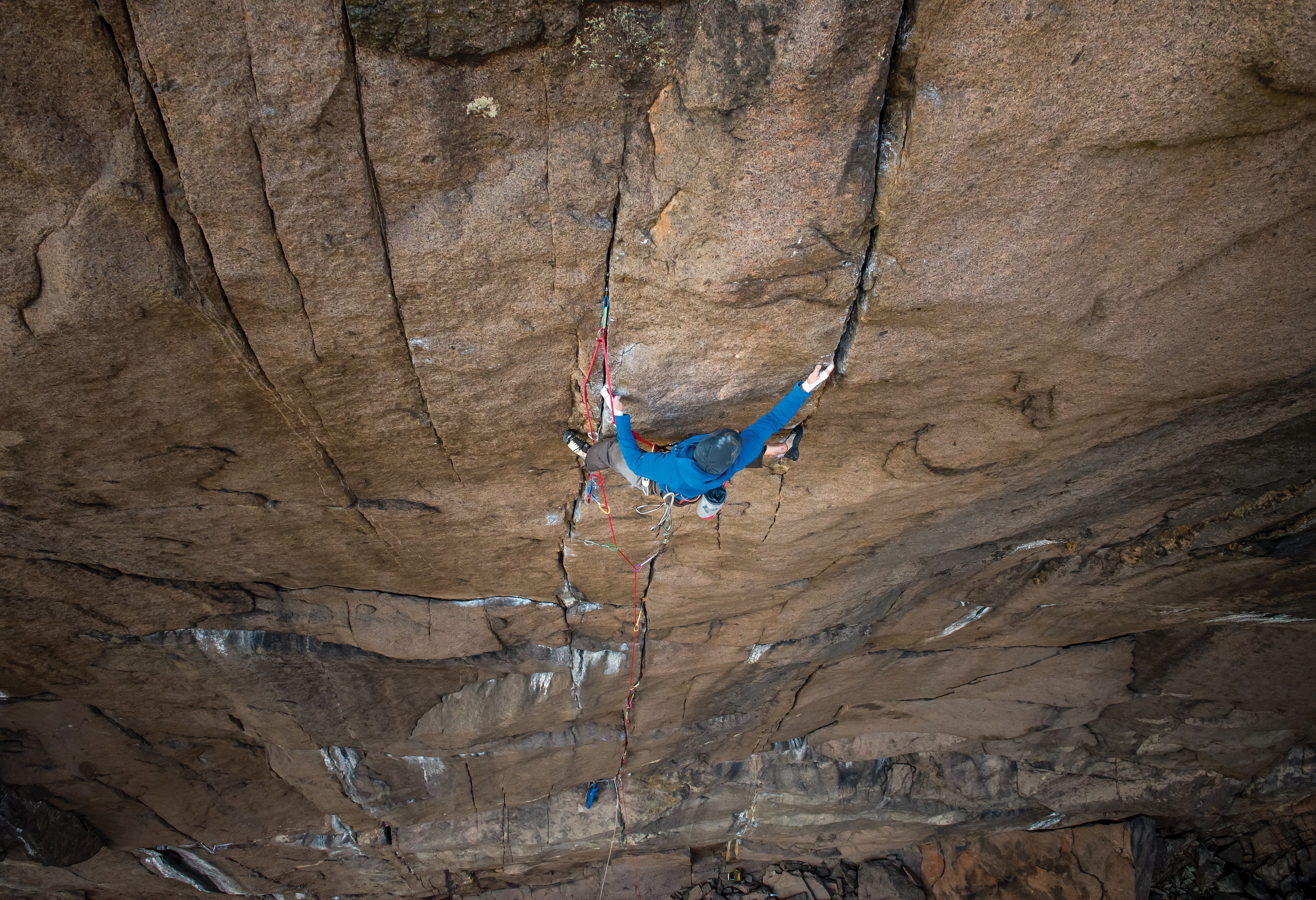 TristanHobson_6850_gn-web Above shot of a man climbing using two cracks