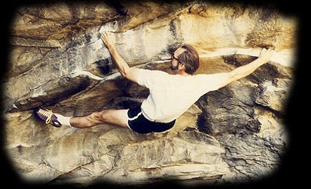 John Gill on Ripper Traverse boulder problem.