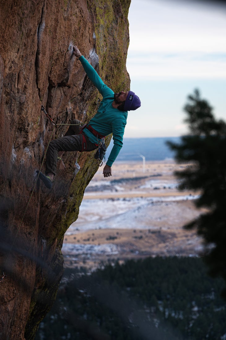 Premium Photo  Crazy climber balancing on a rock. loss of balance