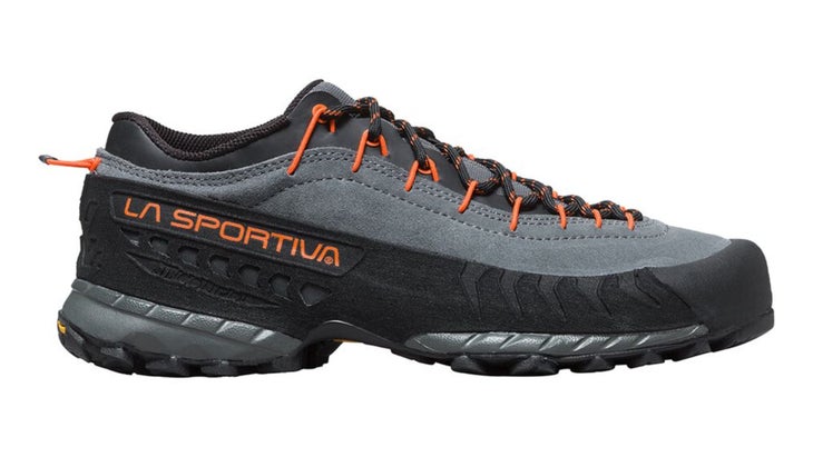 Black and gray running shoe with orange accents
