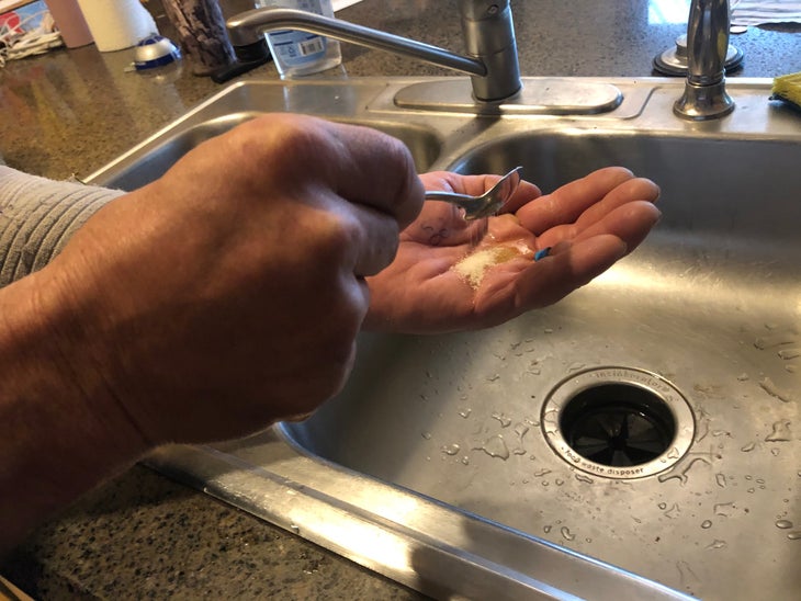 Oil and sugar on hands