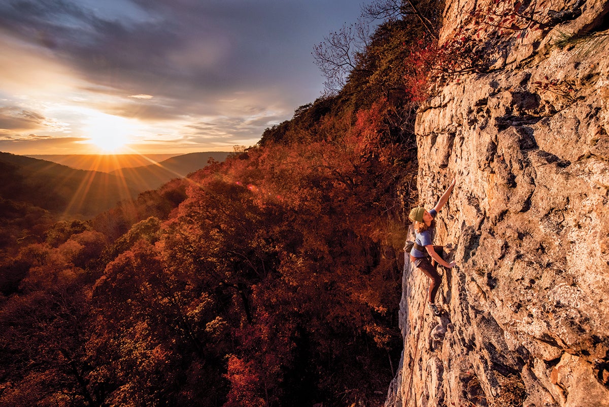 Cody Roney cools down on Three Star Salad Bar (5.10a). Roney was executive director of the Southeastern Climbers Coalition during the arduous process from 2012–2016 of establishing public access to Denny Cove. Thanks to her efforts and those of others, the crag has been permanently preserved.