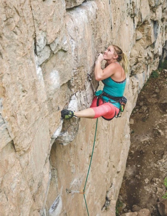 Alyse Dietel works the heel hook—and hamstring—on Community Service (5.11d), Rifle, Colorado.