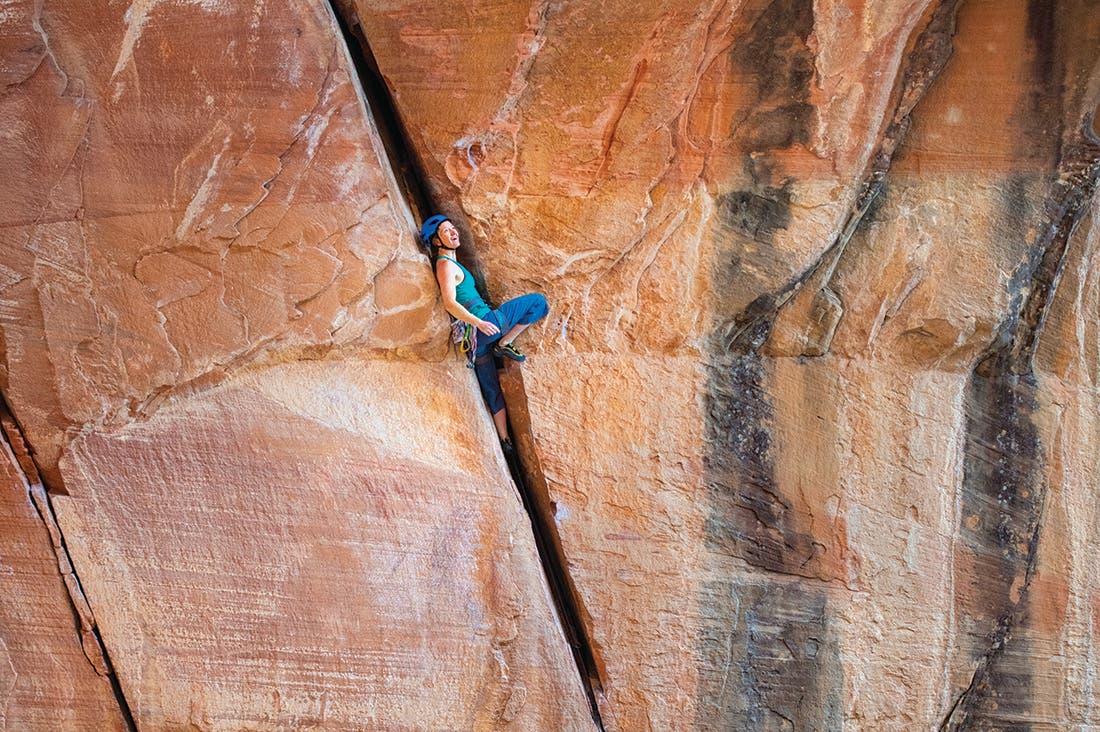Climber resting on Synethesia