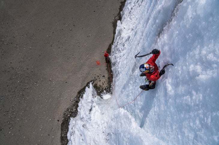 Climber ice climbs on Mt. Kilimanjaro.