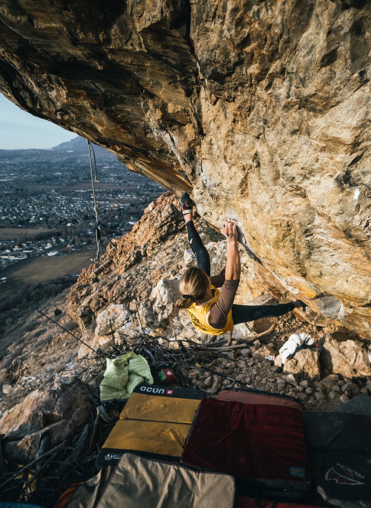 Allison Vest crimping hard toward the top of the problem.