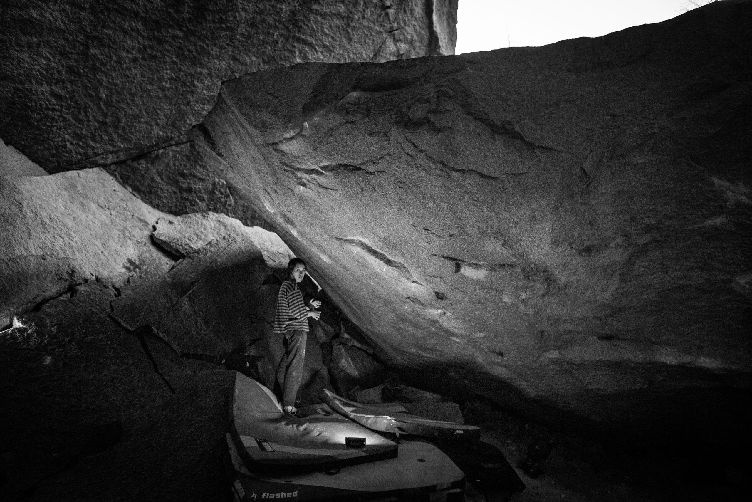 Katie Lamb in a moody black and white picture under Room Service, V12, in Squamish, BC.