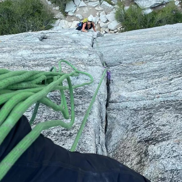 Above shot of Tiffany Thiele climbing up a rock