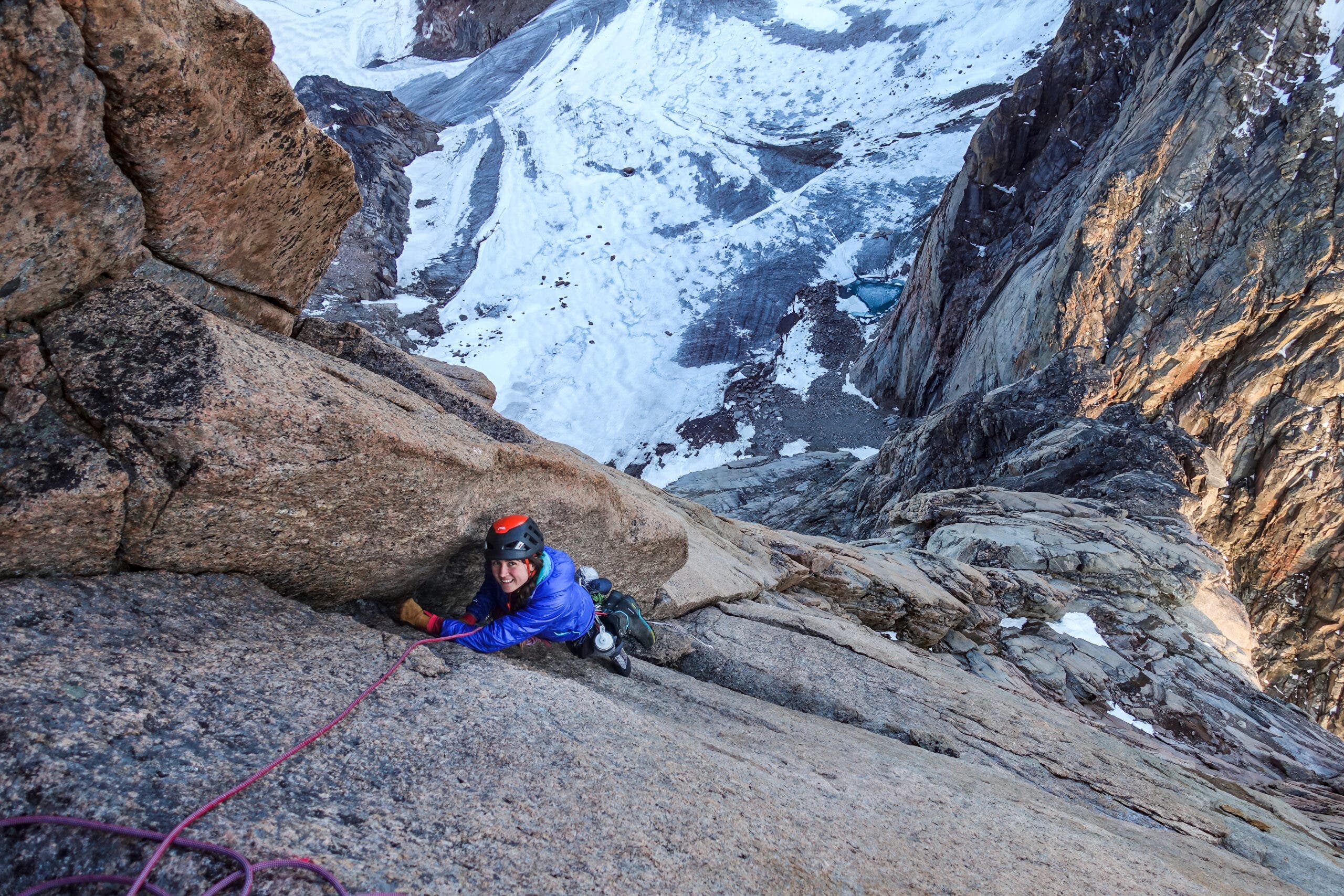 Bronwyn Hodgins ascending a sheer rock face on Baffin Island