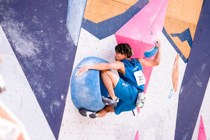 Yoshiyuki Ogata of Japan climbs to the bronze in Boulder.