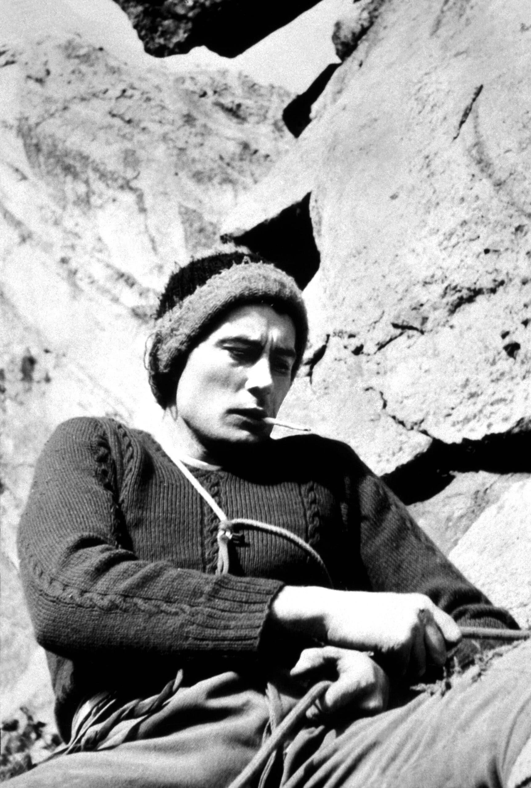 Layton Kor smoking a cigarette in 1964