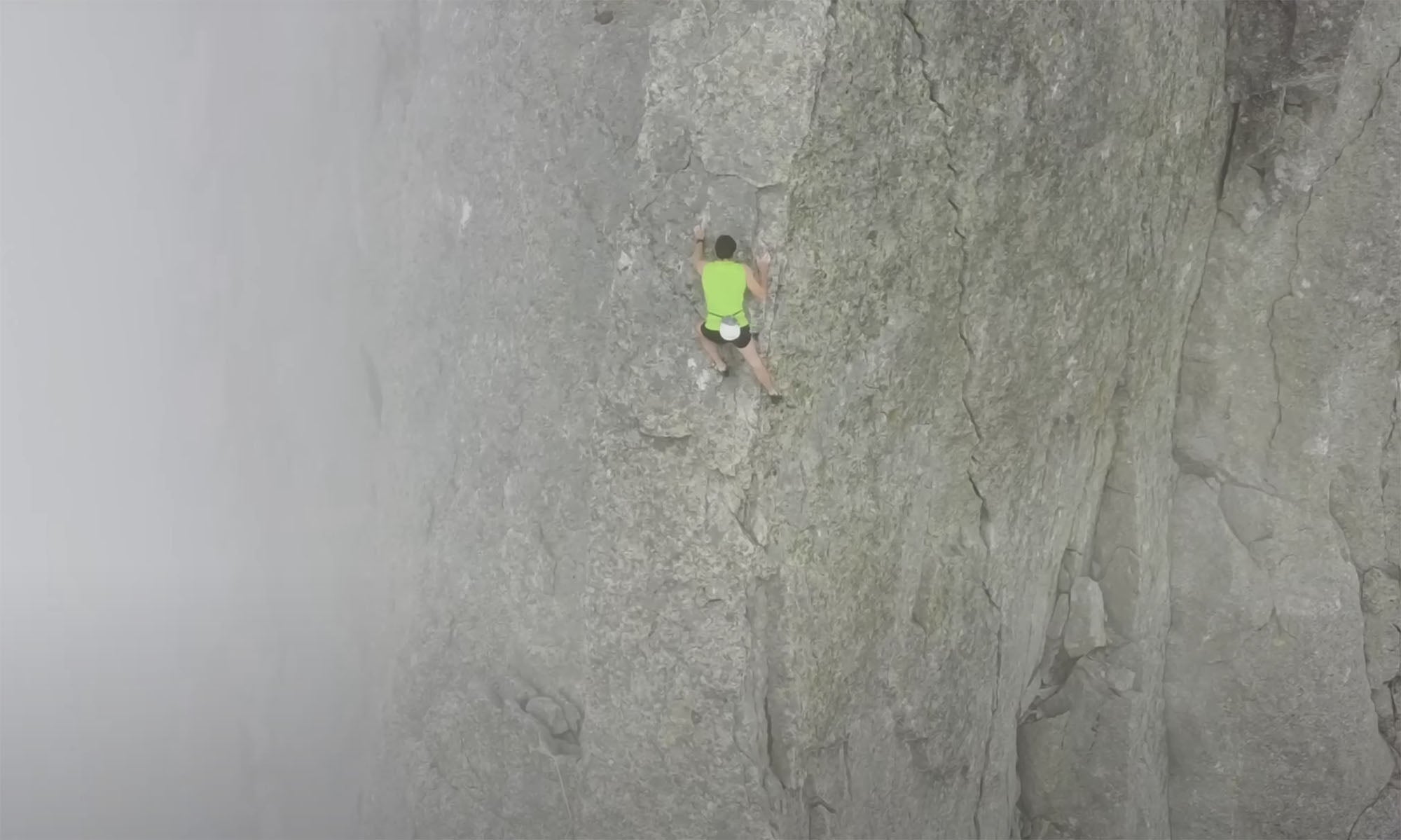Climber Filip Babicz setting speed record on the north ridge of Piz Badile in the Alps.