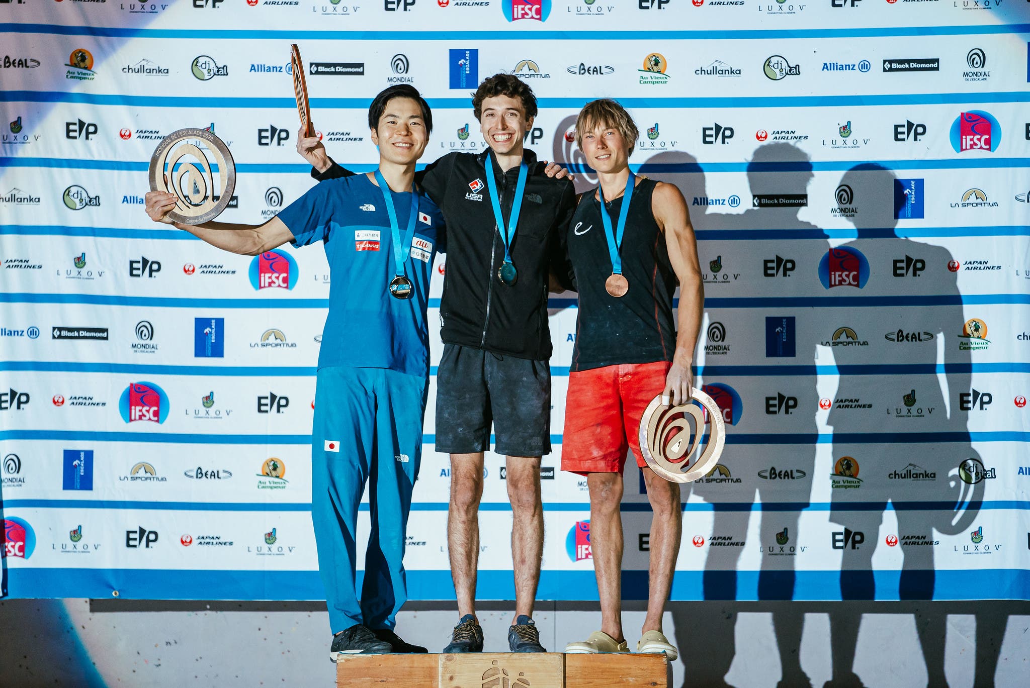 The podium of the men's Lead event during the 2022 IFSC World Cup in Briançon, France.