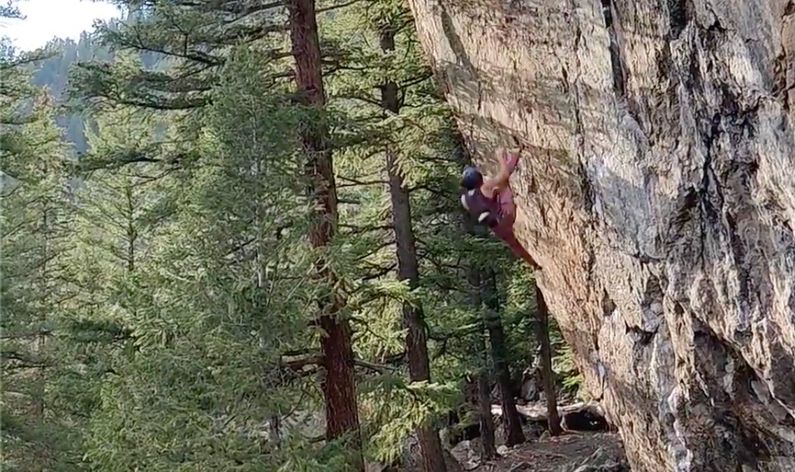 Rock climber falls upside down while downclimbing.