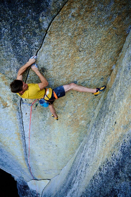 Didier Berthod climbs an overhanging finger crack in Squamish, BC.