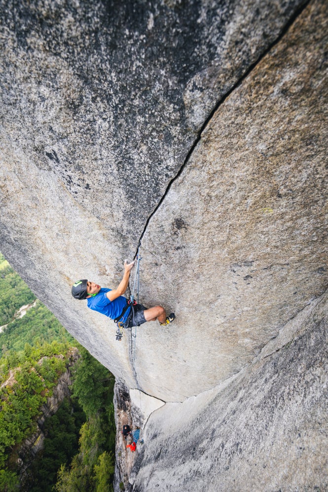 Connor Herson jams 5.14 crack at the top of Squamish's Chief.