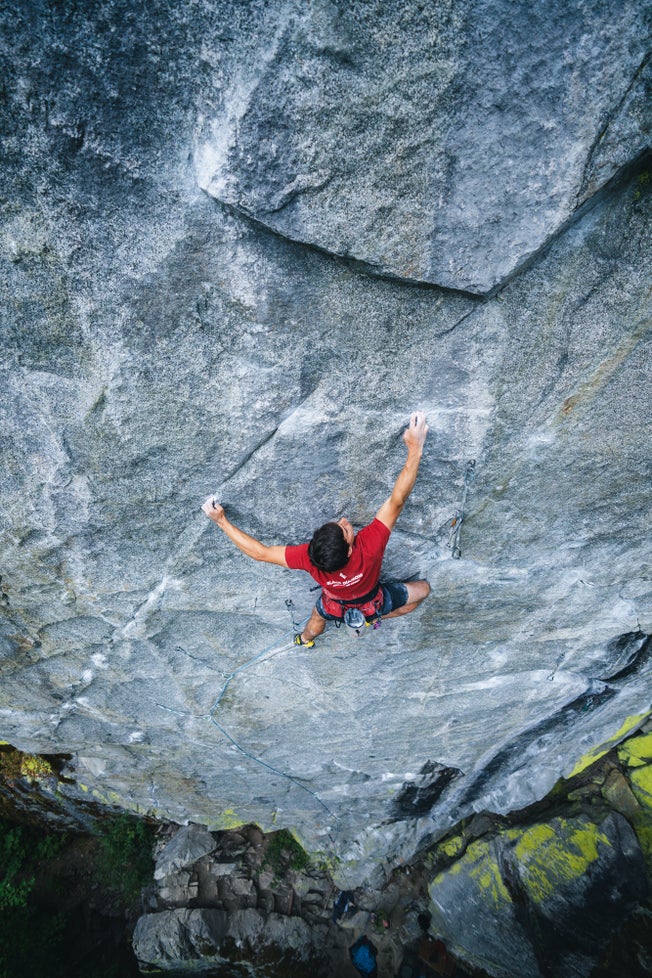 Connor Herson climbs vertical granite face, Spirit Quest, in Squamish.