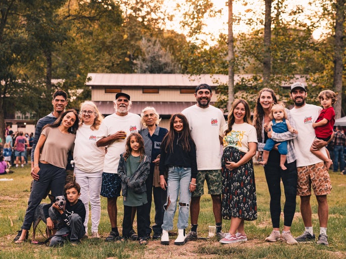 Big, smiling family.