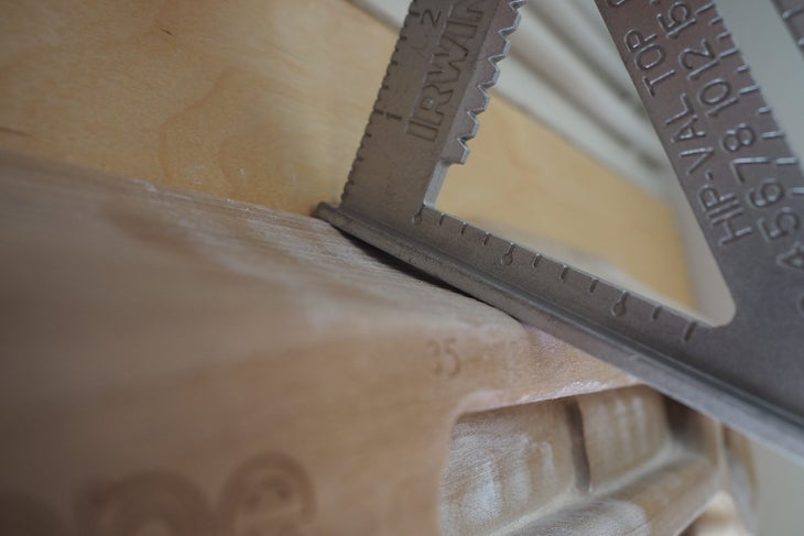 The sloper on the Tension Honestone, with a construction square showing how the sloper's concave variable edge works.