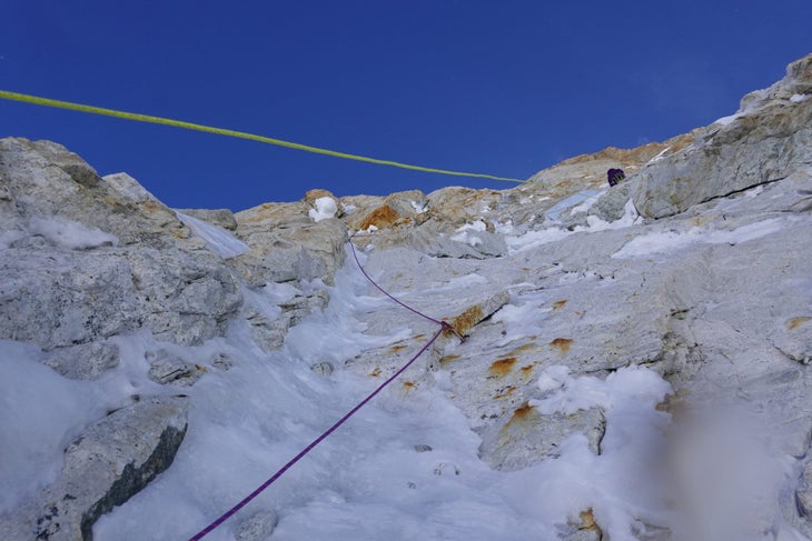 Marvell leads a steep pitch (note the tag line hanging in space) low on the headwall, at 7,200 meters (23,600ft).